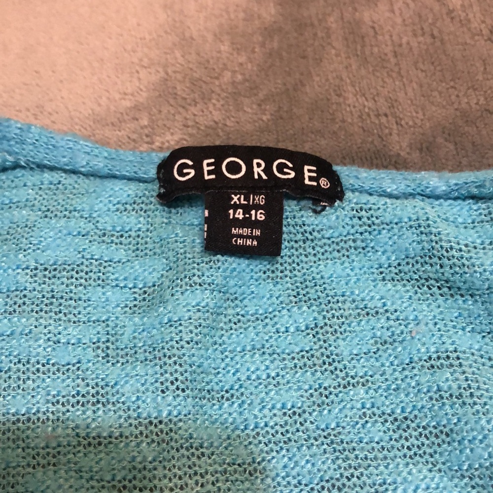 George shrug - Picture 3 of 4